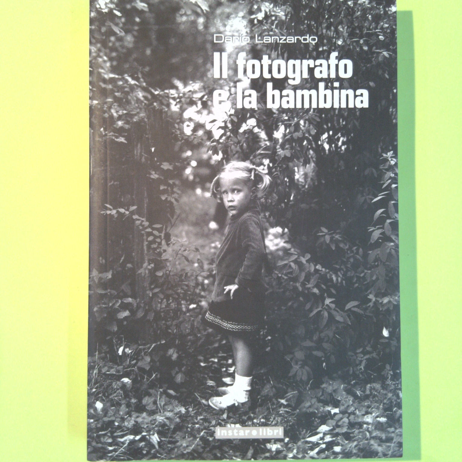 IL FOTOGRAFO E LA BAMBINA